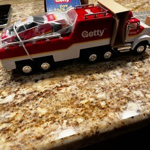 1995 Getty toy race car carrier new in box